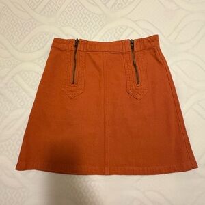 Chic Rust-colored Denim Mini Skirt with Zipper Accents